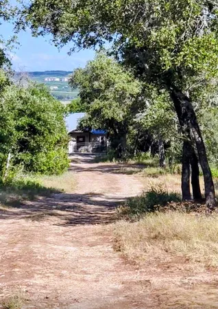 a view of swimming pool with a yard