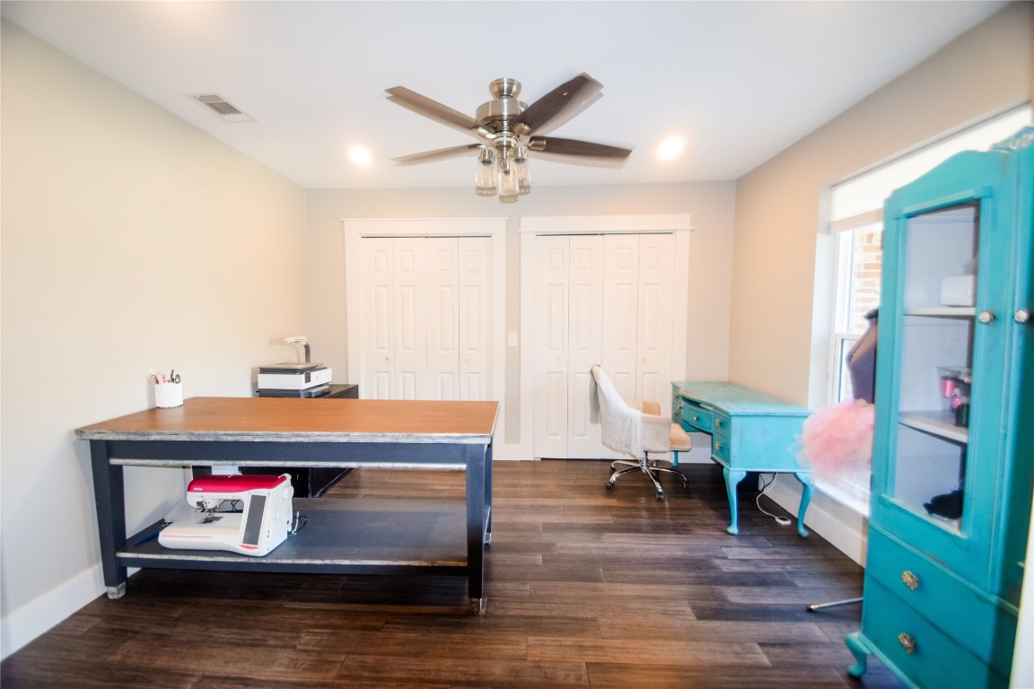 3618 Quiette Drive Austin, TX 78754 - Photo 17 of 31 a room with furniture and a wooden floor