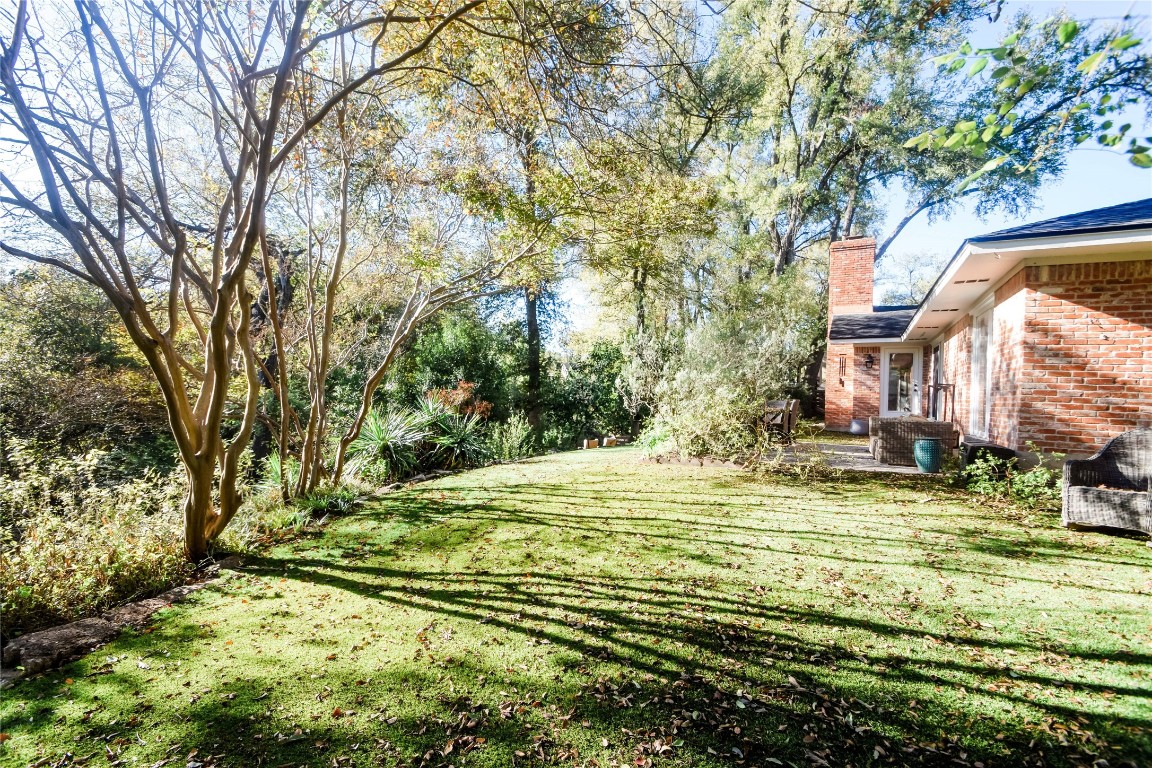 3618 Quiette Drive Austin, TX 78754 - Photo 22 of 31 a view of a pool with a yard