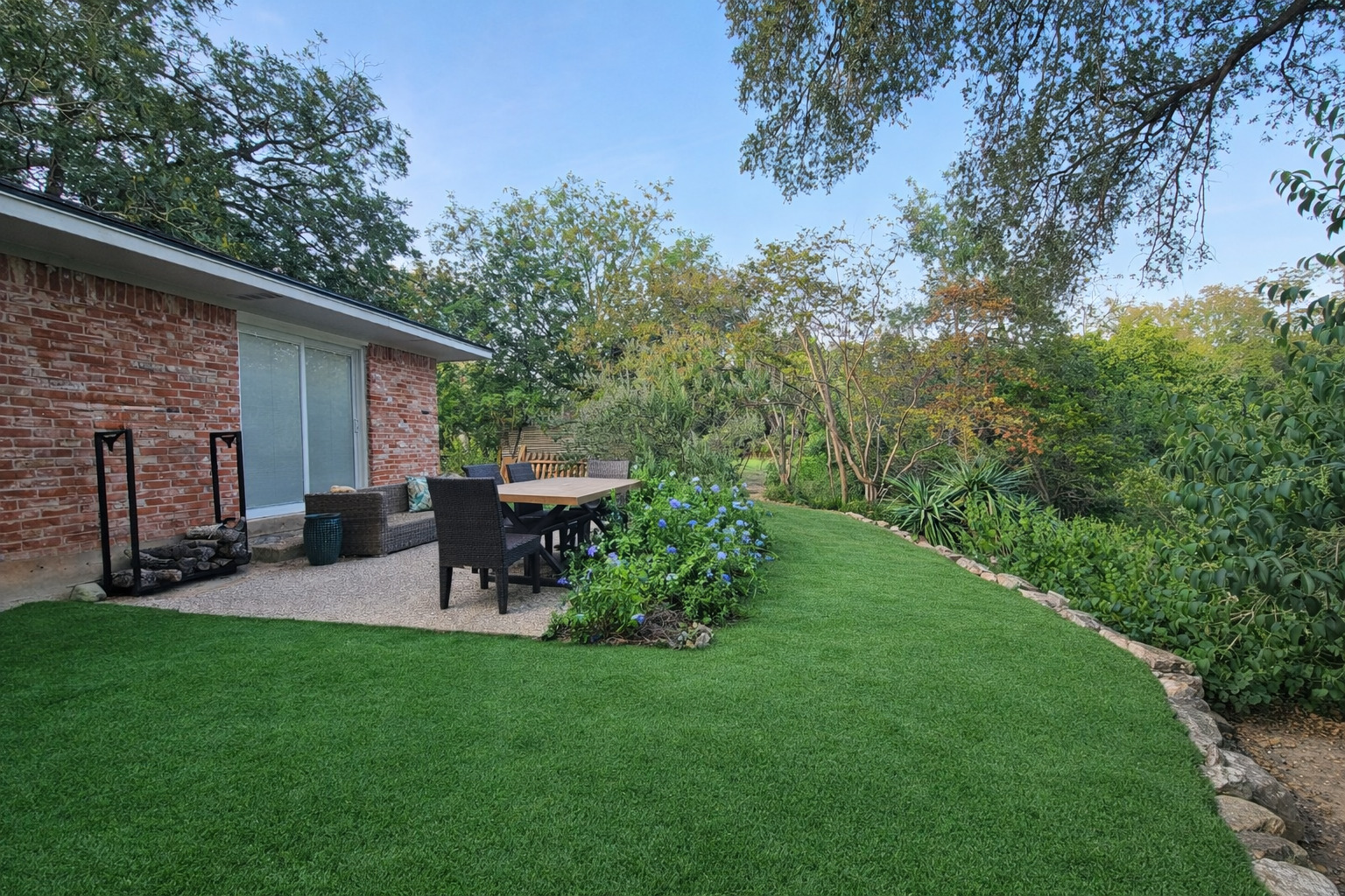 3618 Quiette Drive Austin, TX 78754 - Photo 23 of 37 View of green lawn featuring a patio area and outdoor dining area