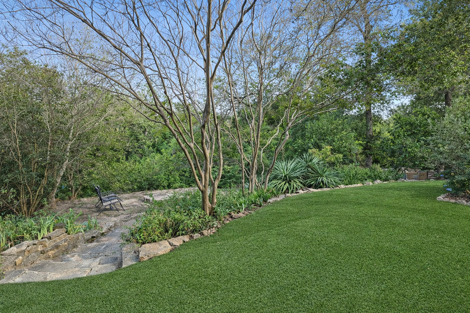 3618 Quiette Drive Austin, TX 78754 - Photo 24 of 37 a view of a grassy field with trees