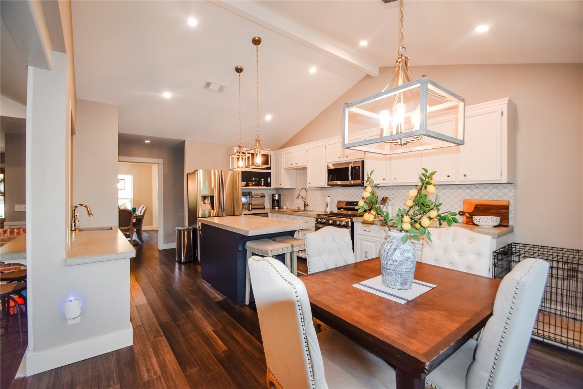 3618 Quiette Drive Austin, TX 78754 - Photo 6 of 31 a large kitchen with a table and chairs