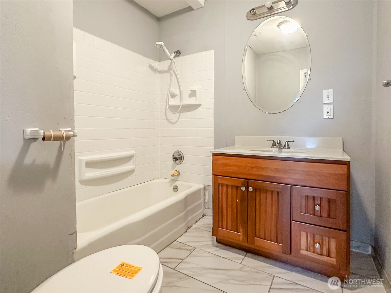1222 West Schley Street Aberdeen, WA 98520 - Photo 17 of 31 a spacious bathroom with a sink double vanity and a mirror