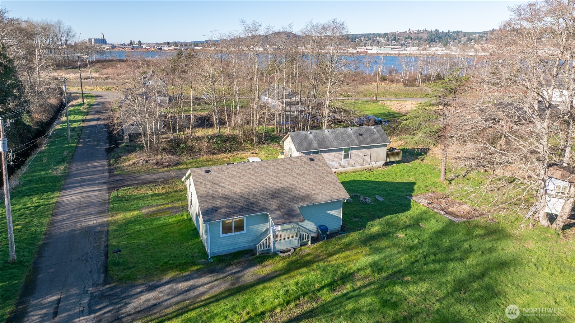 1222 West Schley Street Aberdeen, WA 98520 - Photo 24 of 31 a aerial view of a house with a yard