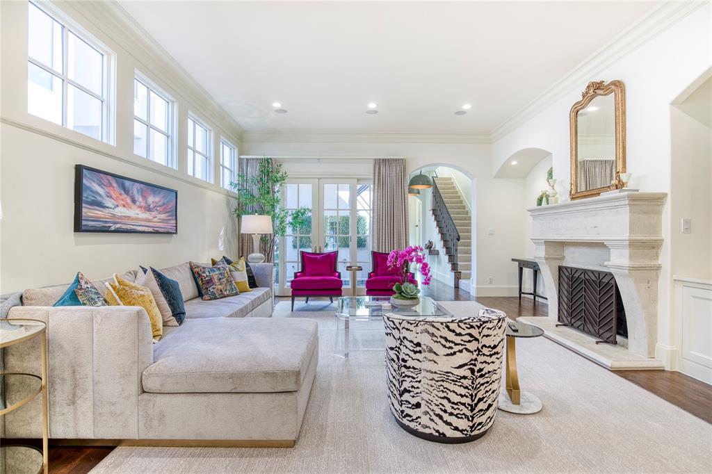 3616 Edgewater Street Dallas, TX 75205 - Photo 1 of 1 a living room with furniture and a fireplace