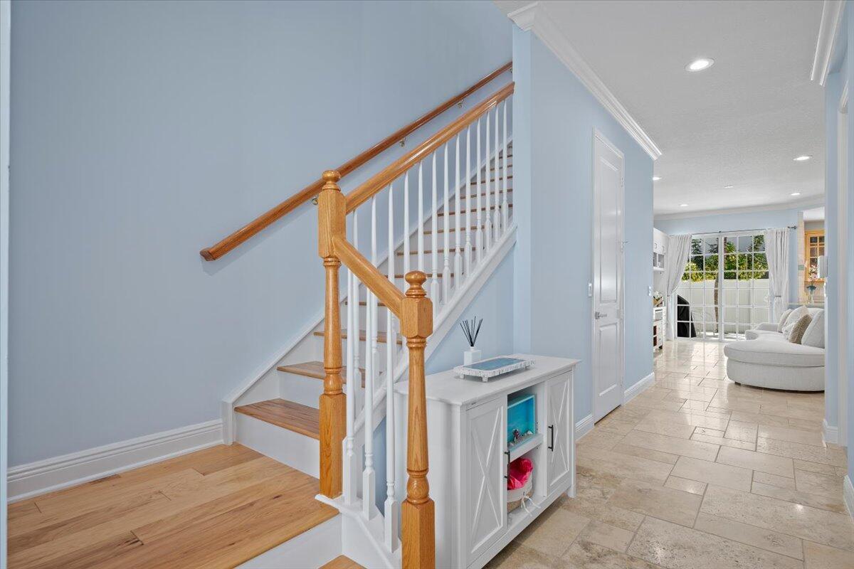 455 Ocean Ridge Way Juno Beach, FL 33408 - Photo 18 of 45 a view of entryway and hall with wooden floor