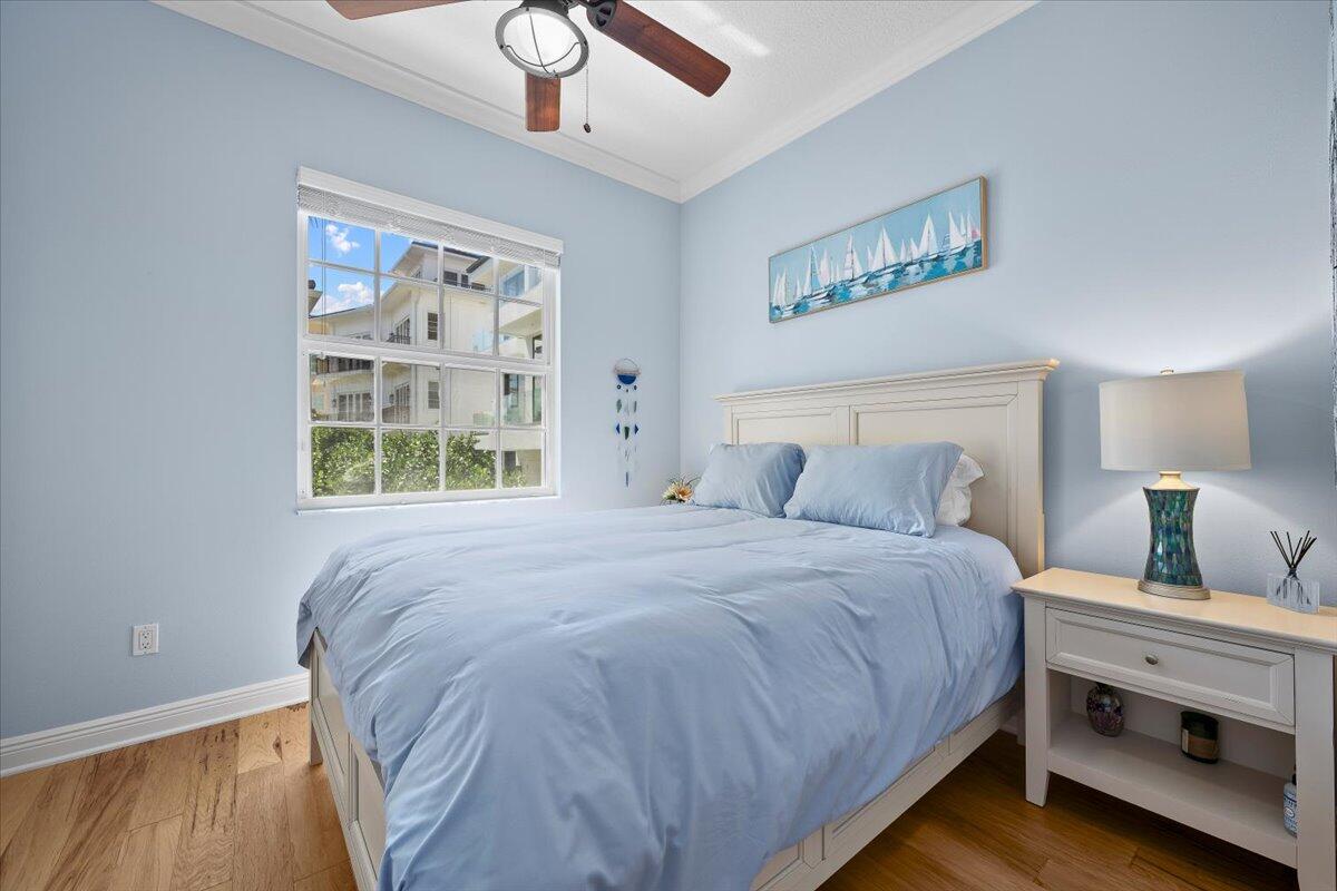 455 Ocean Ridge Way Juno Beach, FL 33408 - Photo 20 of 45 a bedroom with a bed and a window