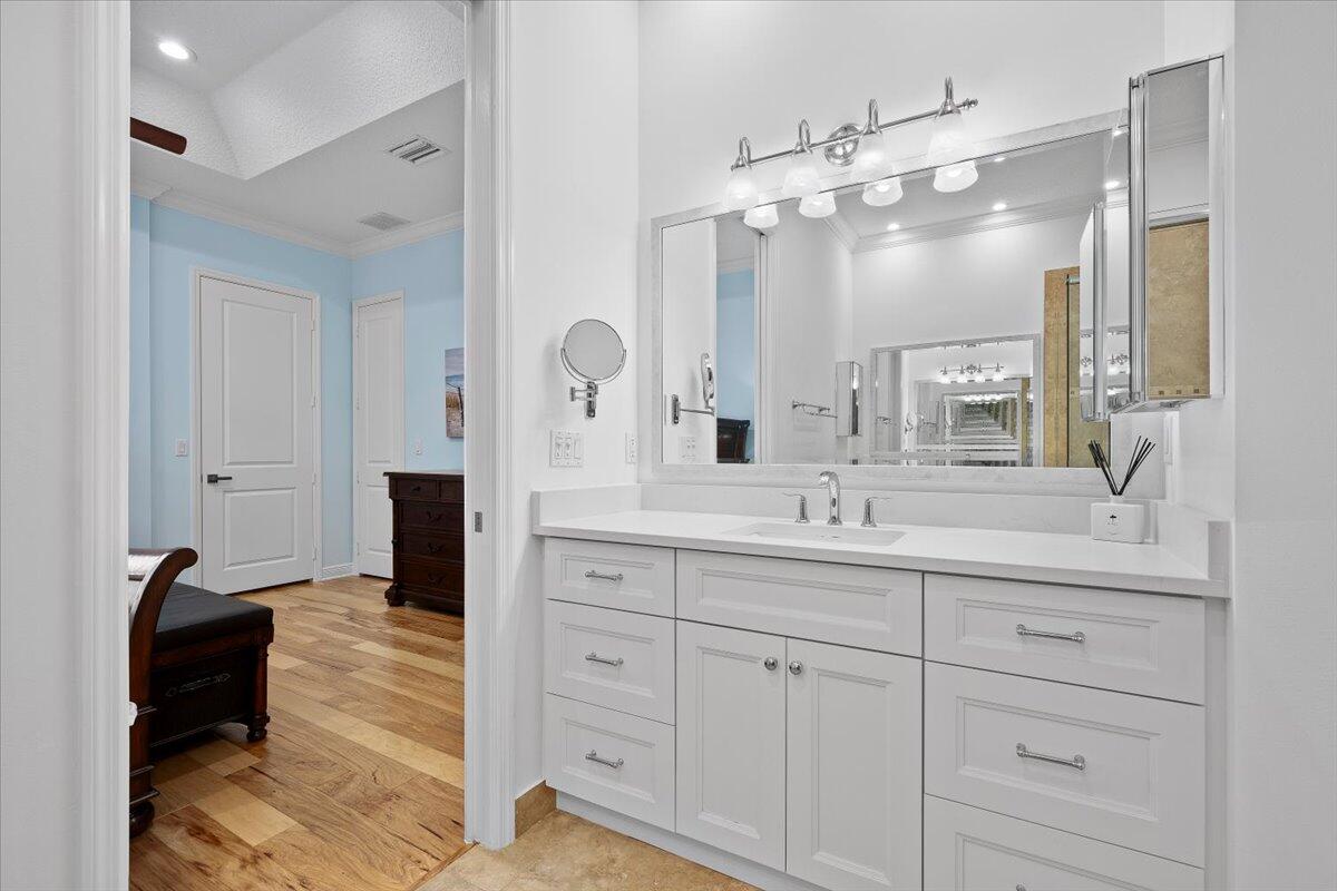 455 Ocean Ridge Way Juno Beach, FL 33408 - Photo 30 of 45 a bathroom with a double vanity sink mirror and shower