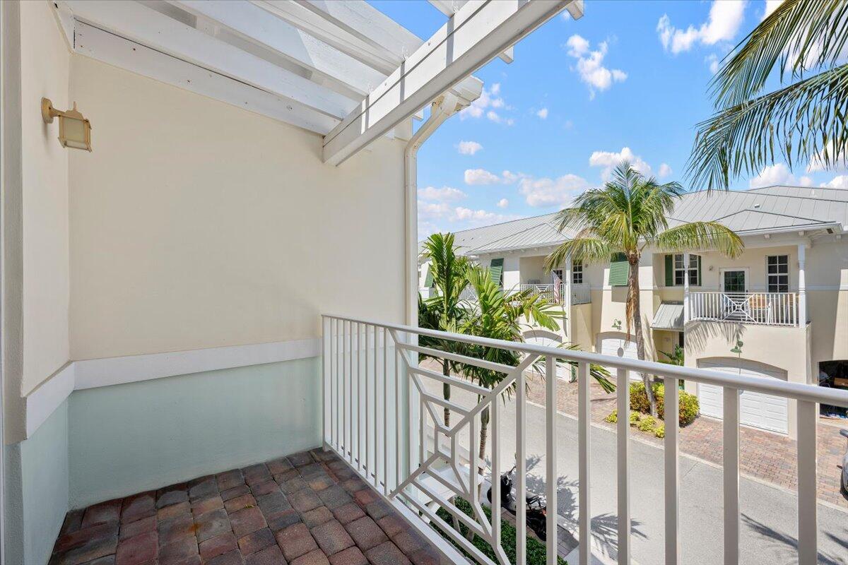 455 Ocean Ridge Way Juno Beach, FL 33408 - Photo 31 of 45 a view of a house with a small yard