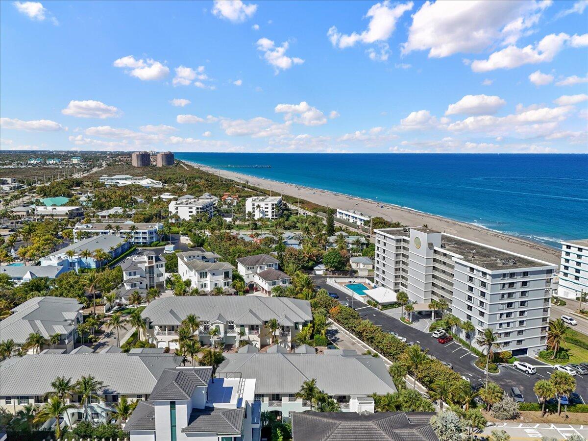 455 Ocean Ridge Way Juno Beach, FL 33408 - Photo 38 of 45 an aerial view of residential building and ocean view