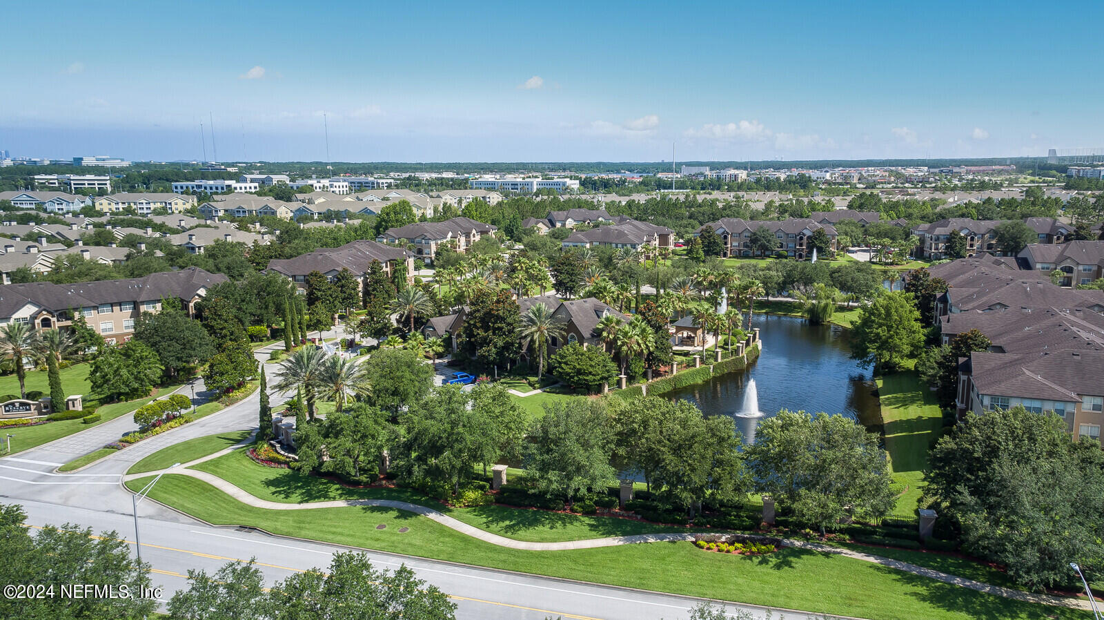 10901 Burnt Mill Road, Unit 2106 Jacksonville, FL 32256 - Photo 18 of 23 an aerial view of a city with lots of residential buildings