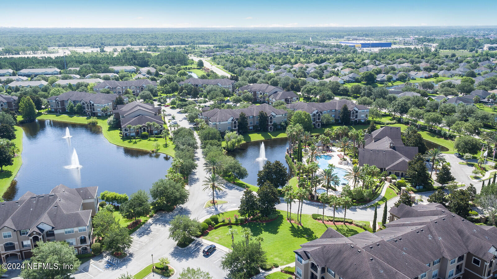 10901 Burnt Mill Road, Unit 2106 Jacksonville, FL 32256 - Photo 23 of 23 an aerial view of a houses with a yard