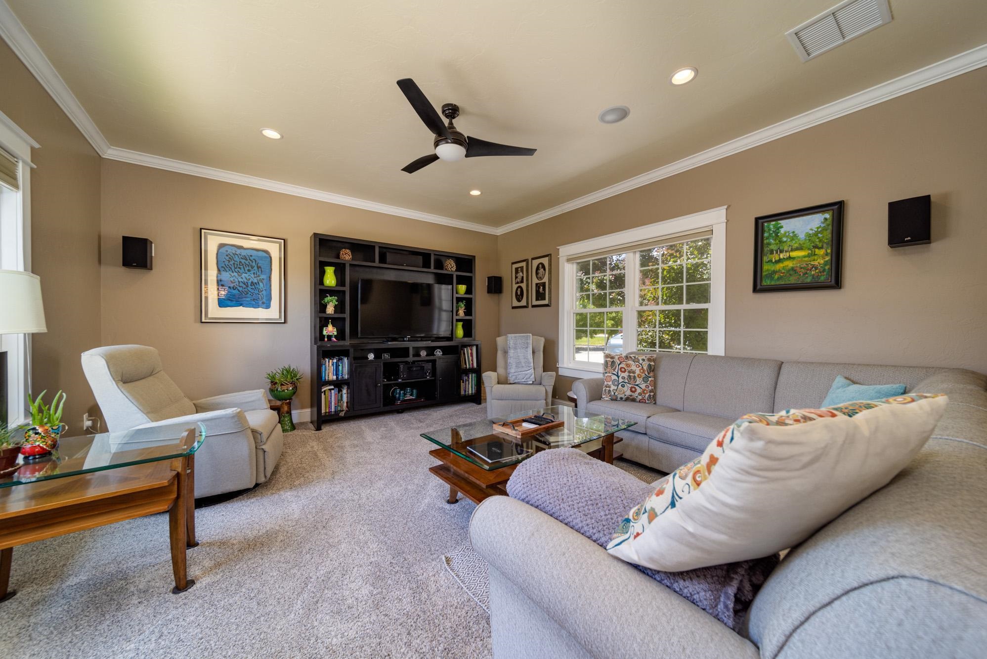 1371 Saddle Ridge Road Loma, CO 81524 - Photo 17 of 42 a living room with furniture and a flat screen tv