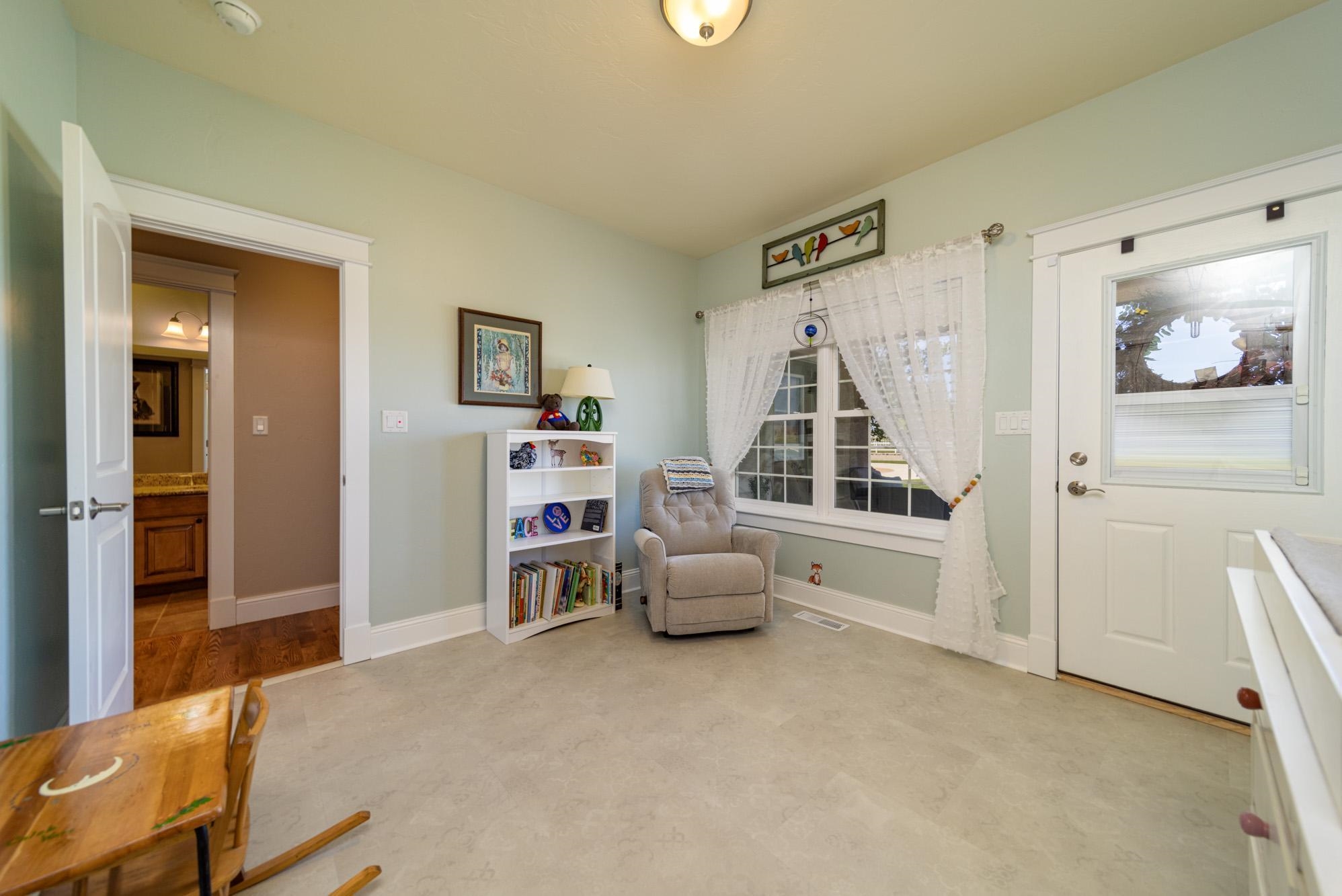 1371 Saddle Ridge Road Loma, CO 81524 - Photo 27 of 42 a bedroom with furniture and a window