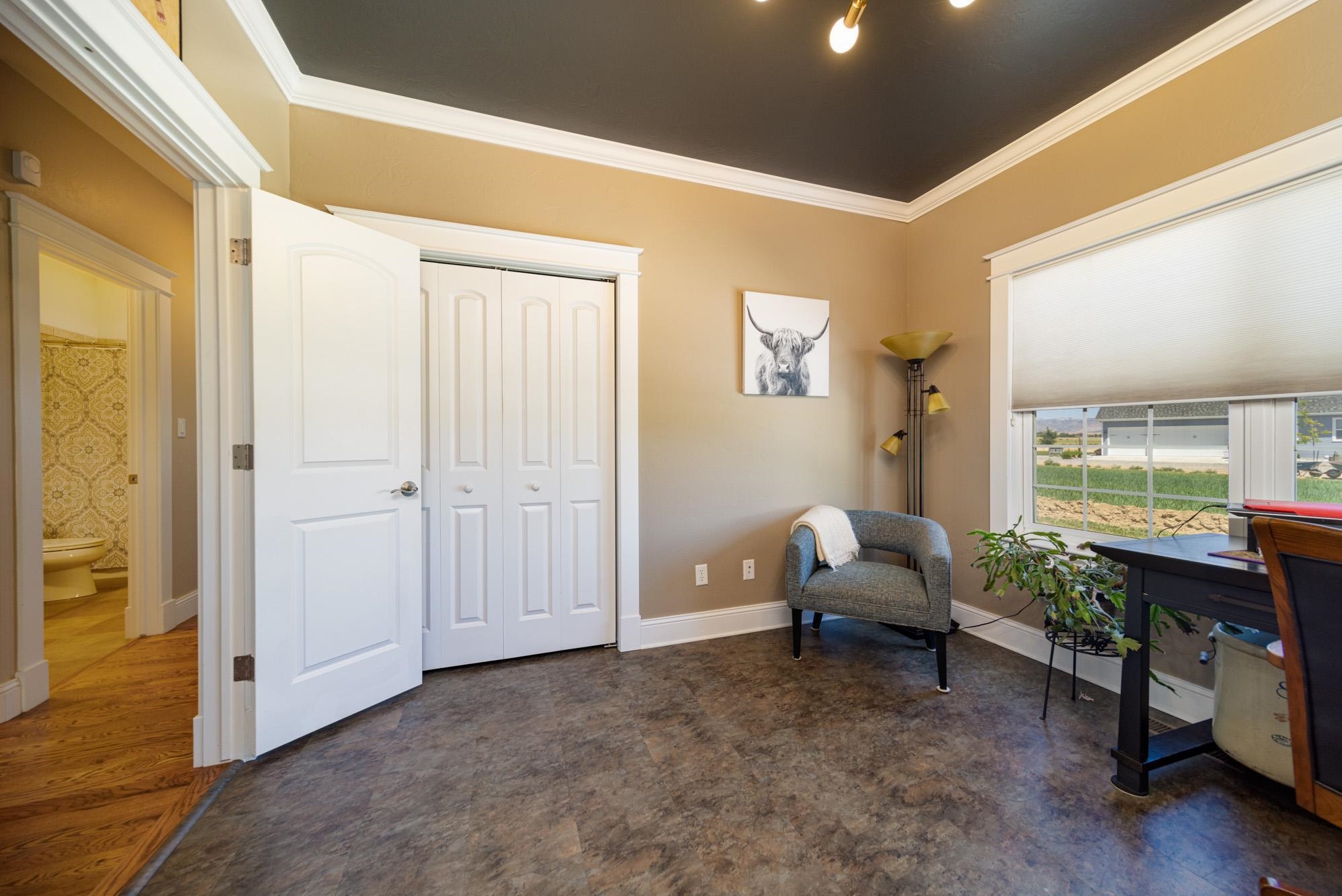 1371 Saddle Ridge Road Loma, CO 81524 - Photo 30 of 42 a living room with furniture and a window