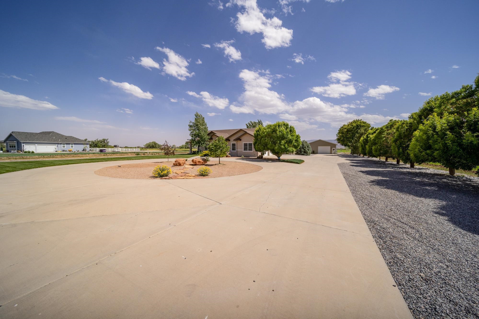 1371 Saddle Ridge Road Loma, CO 81524 - Photo 3 of 42 a view of an ocean and city