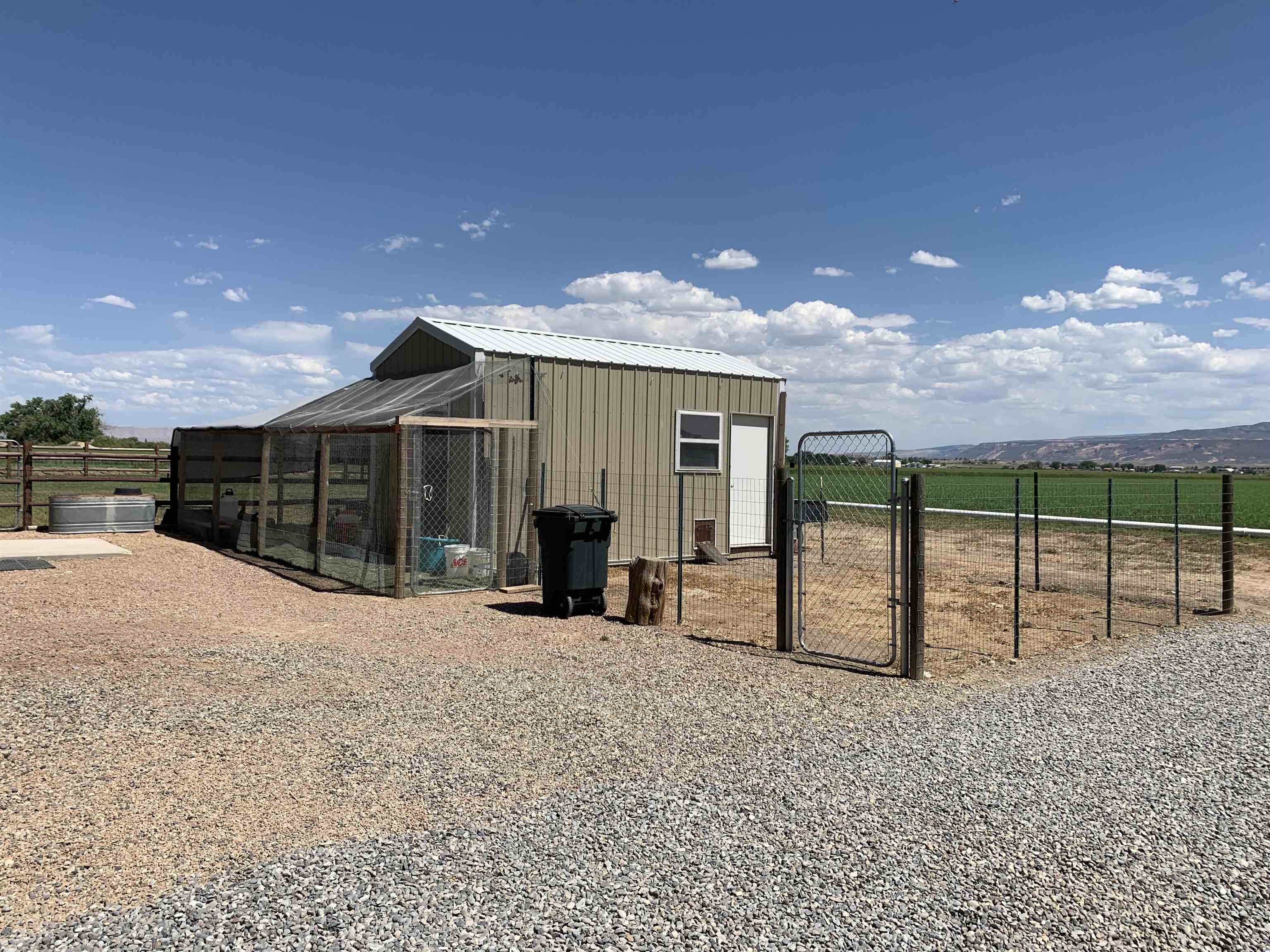 1371 Saddle Ridge Road Loma, CO 81524 - Photo 39 of 42 a view of a house with a outdoor space