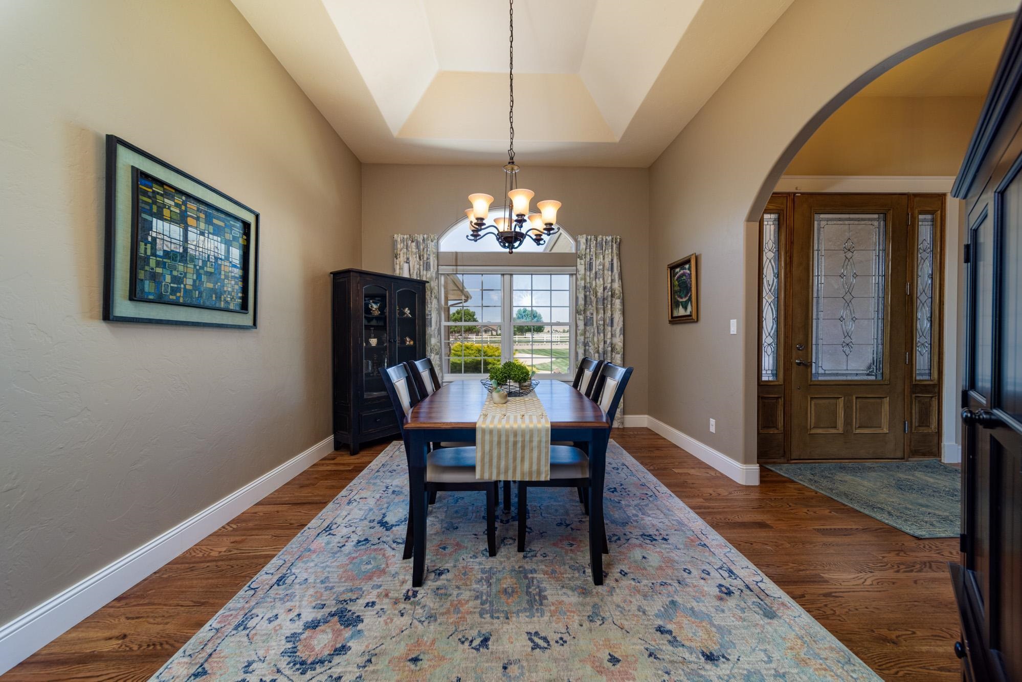 1371 Saddle Ridge Road Loma, CO 81524 - Photo 6 of 42 a dining room with furniture and window