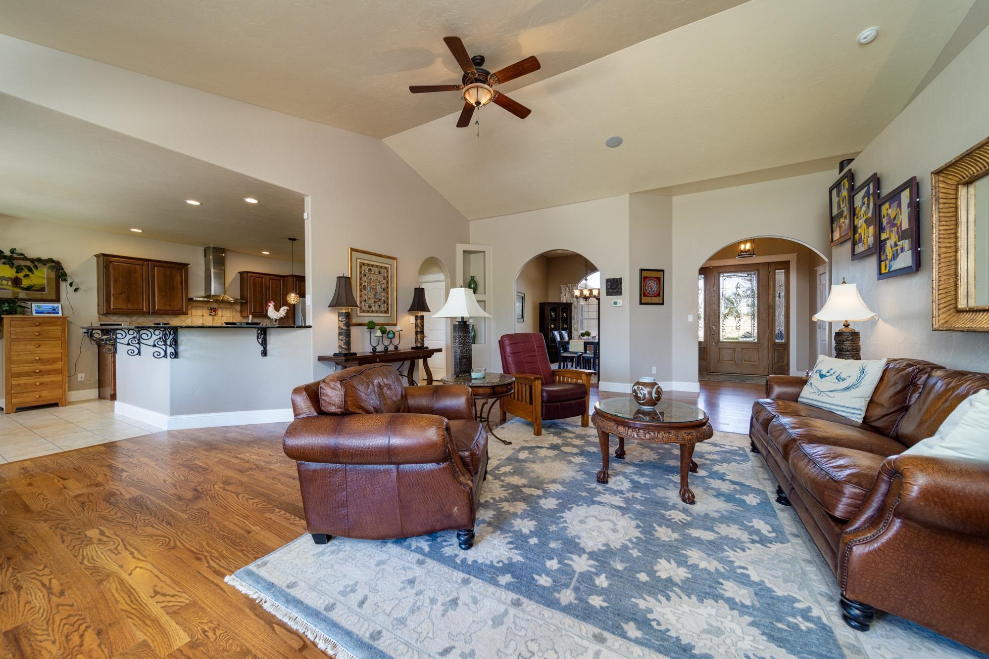 1371 Saddle Ridge Road Loma, CO 81524 - Photo 8 of 42 a living room with furniture and wooden floor