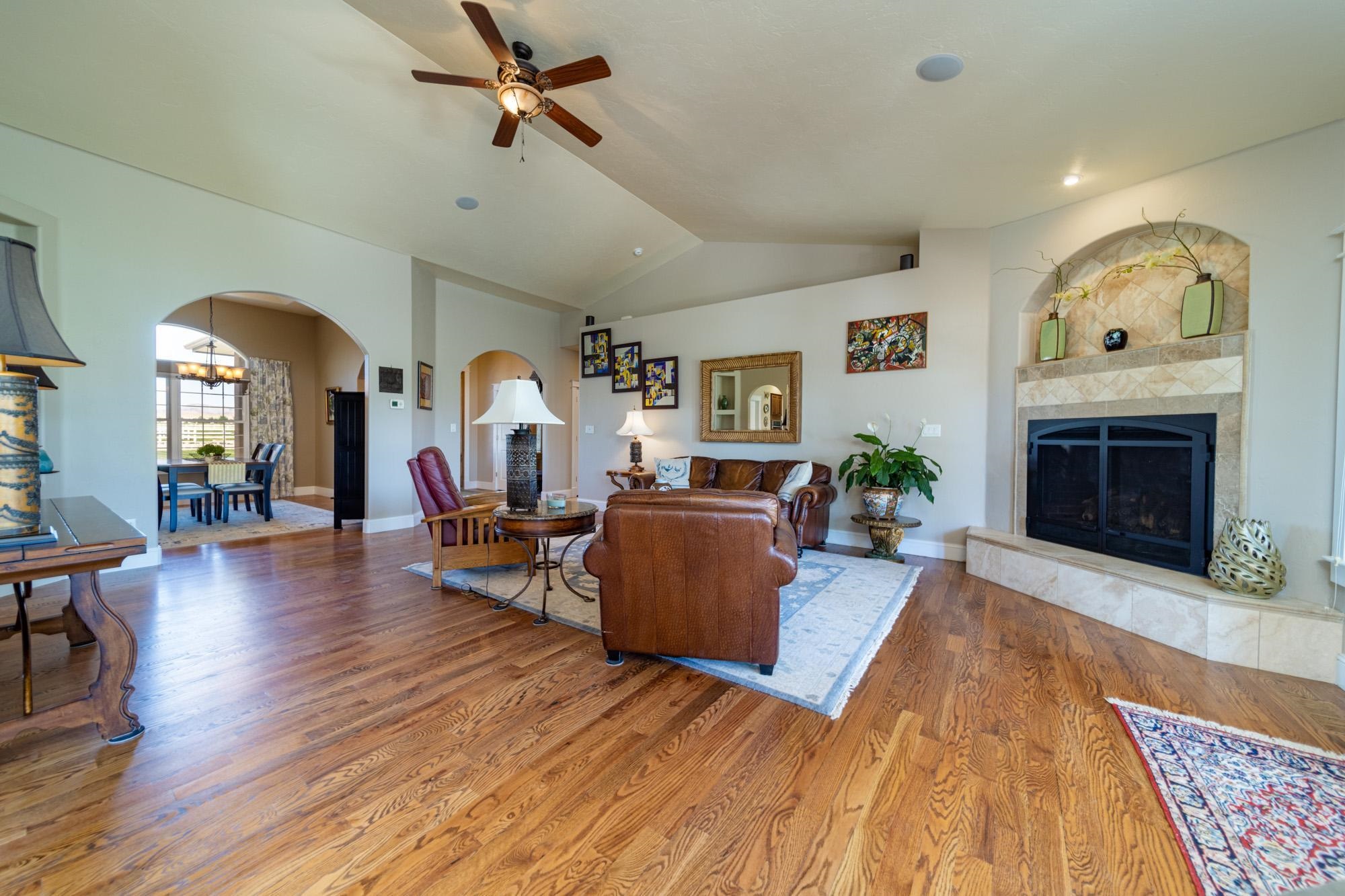 1371 Saddle Ridge Road Loma, CO 81524 - Photo 10 of 42 a living room with furniture and a fireplace