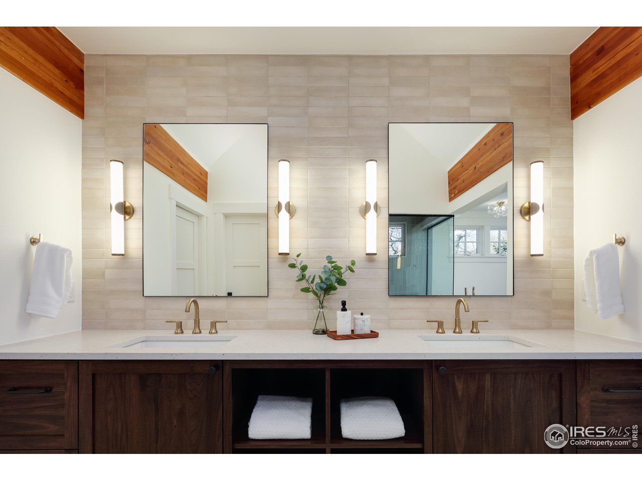 2088 Alpine Dr. Boulder, CO 80304 - Photo 16 of 37 a bathroom with a sink and a mirror