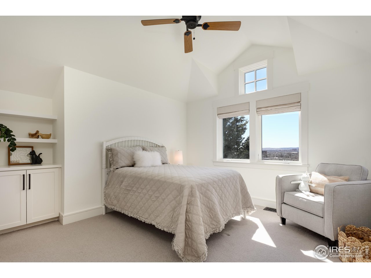 2088 Alpine Dr. Boulder, CO 80304 - Photo 21 of 37 a bedroom with a bed and a couch