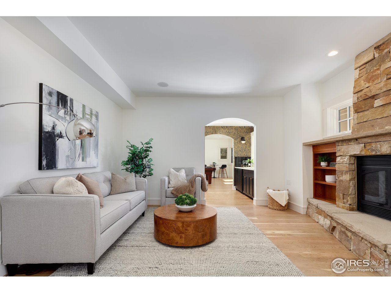 2088 Alpine Dr. Boulder, CO 80304 - Photo 26 of 37 a living room with furniture and a fireplace