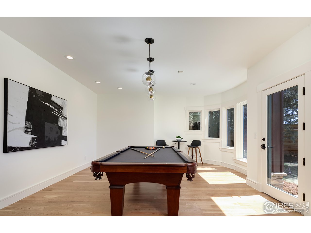 2088 Alpine Dr. Boulder, CO 80304 - Photo 29 of 37 a living room with furniture and a flat screen tv