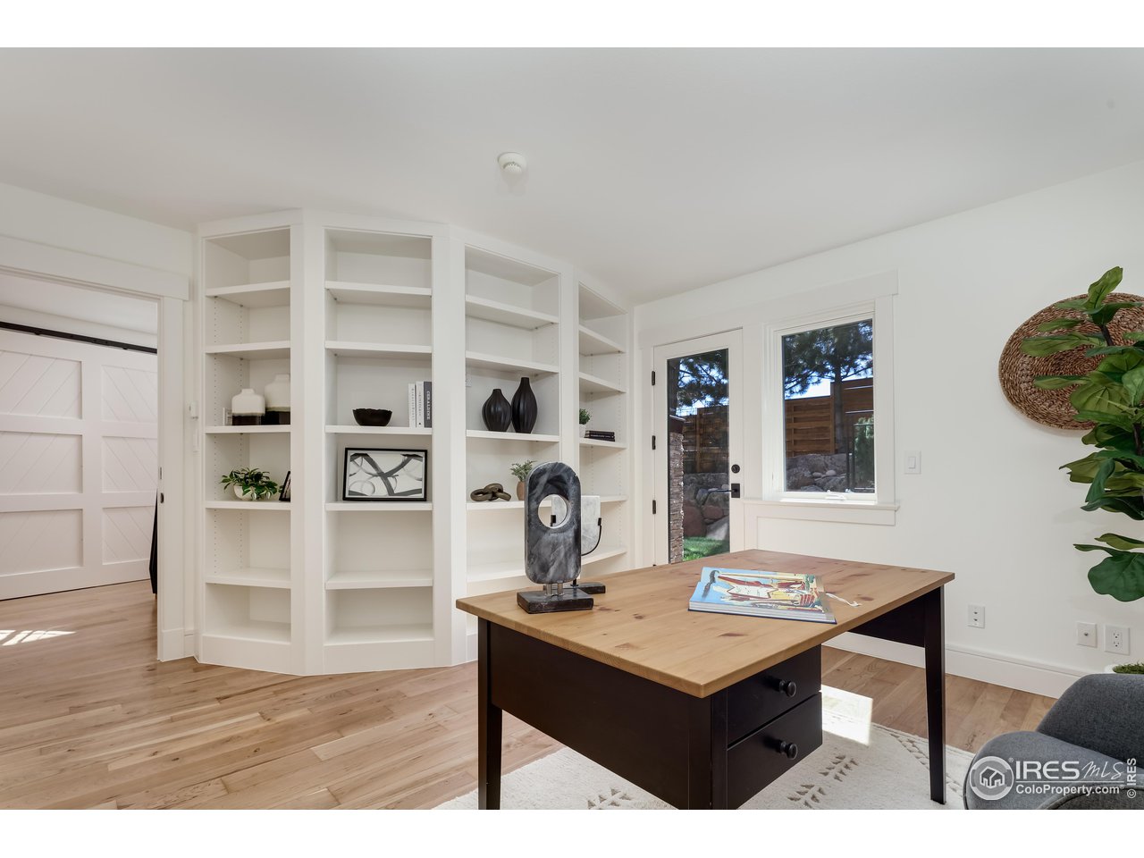 2088 Alpine Dr. Boulder, CO 80304 - Photo 31 of 37 a living room with furniture a rug and kitchen view