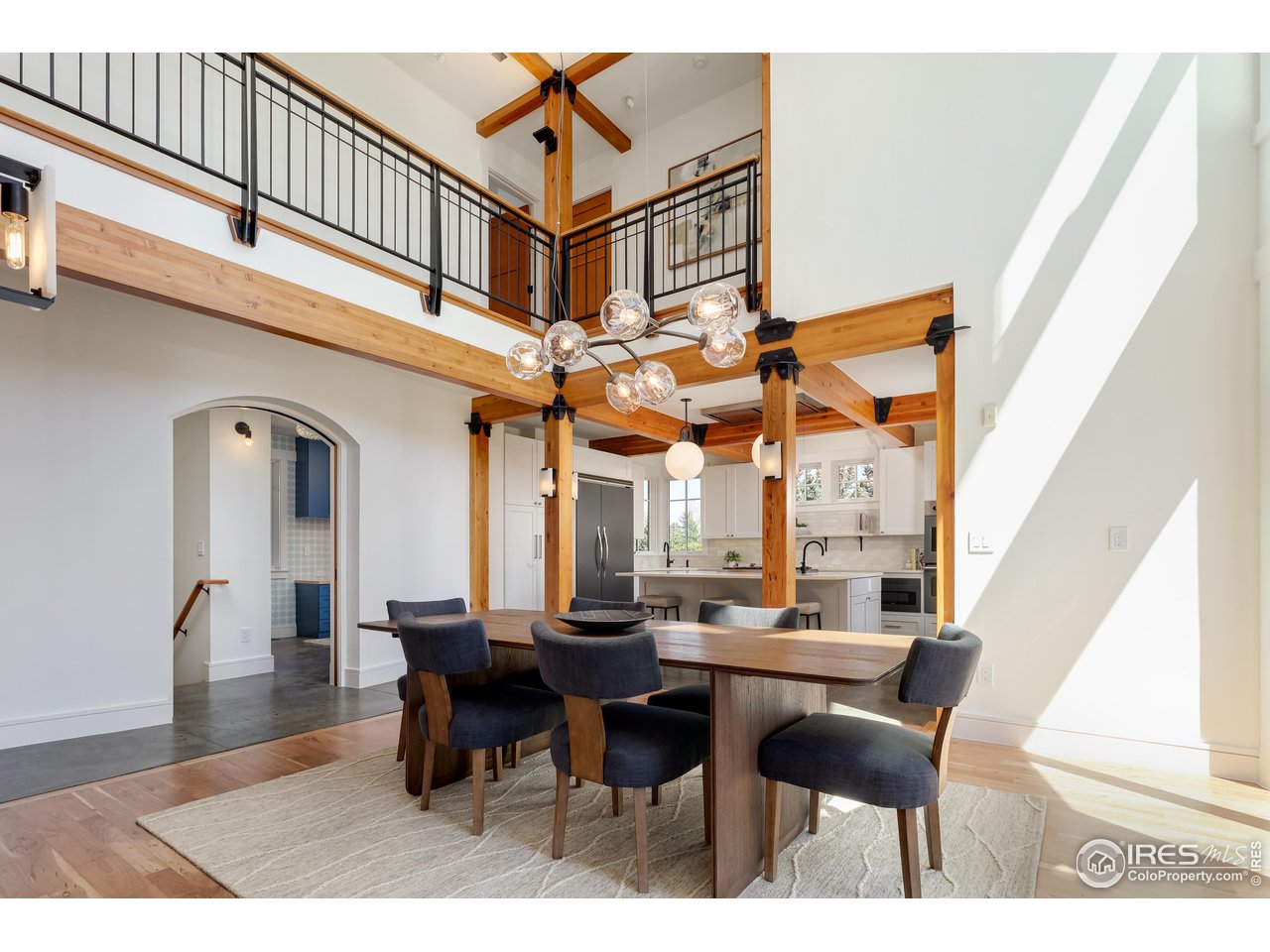 2088 Alpine Dr. Boulder, CO 80304 - Photo 10 of 37 a view of a dining room with furniture and a large window