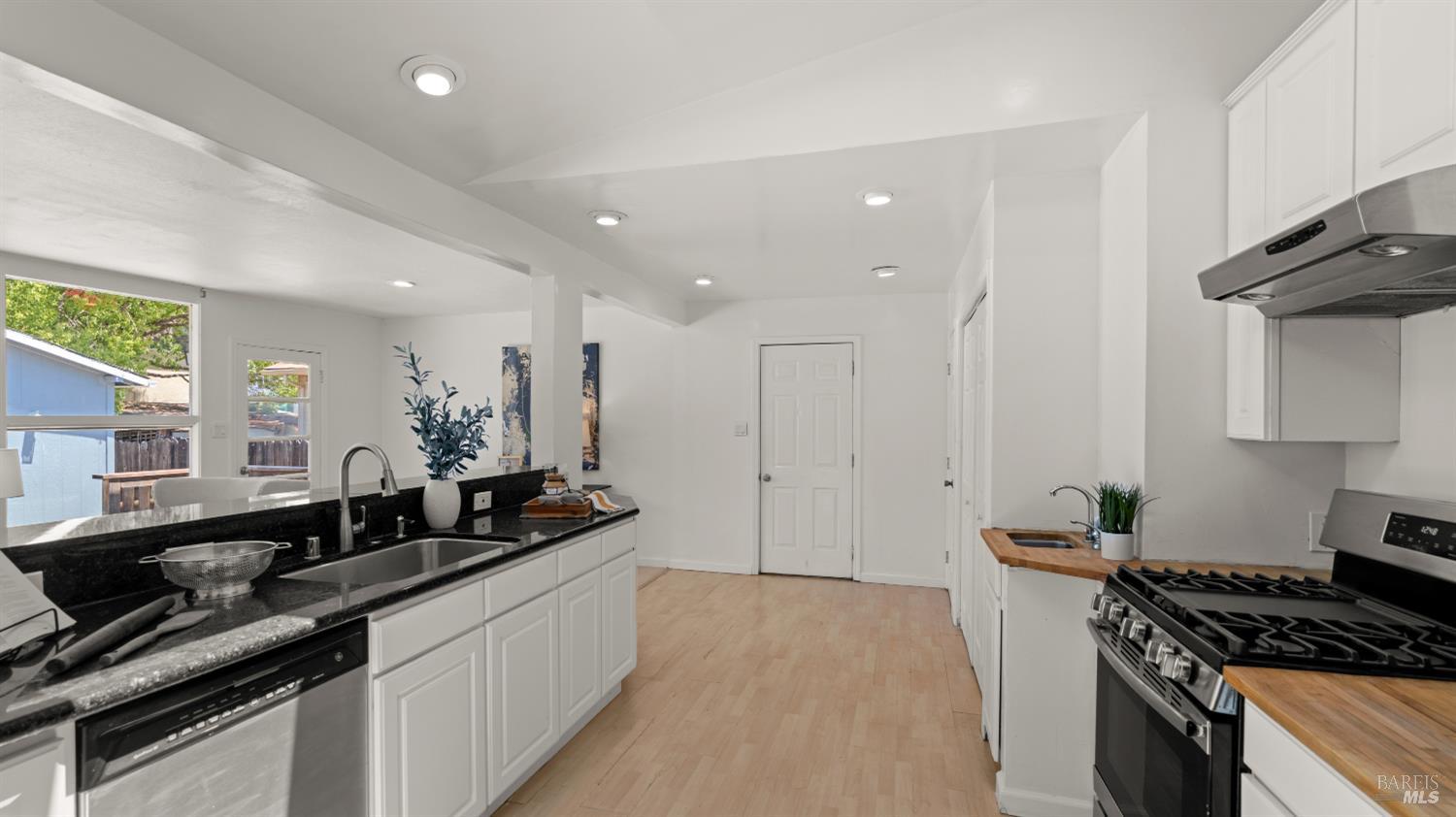 38 Bret Avenue San Rafael, CA 94901 - Photo 14 of 52 a kitchen with a sink and stove