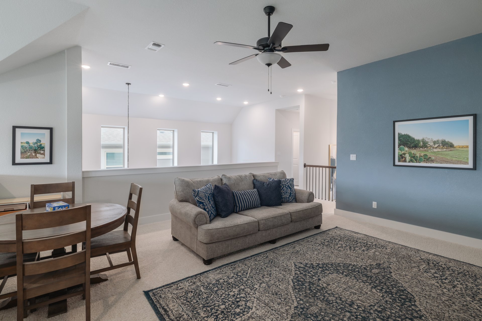 317 Autumn Oak Way Georgetown, TX 78628 - Photo 30 of 40 a living room with furniture and a ceiling fan