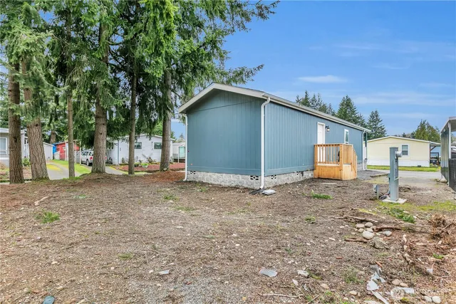 a backyard of a house with lots of green space