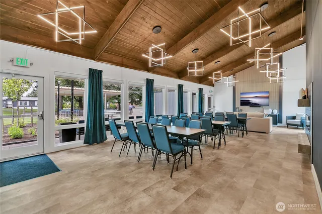 a view of a dining room with furniture window and outside view
