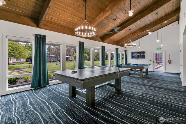 a view of a dining room with furniture