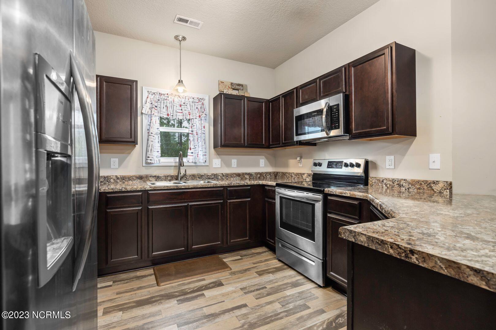 332 Frisco Way Holly Ridge, NC 28445 - Photo 5 of 10 332.3