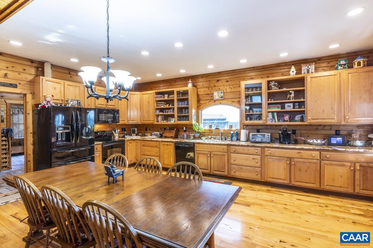 556 Good Hope Church Road Aroda, VA 22709 - Photo 24 of 75 a large kitchen with a table and chairs