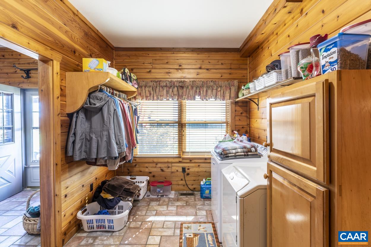 556 Good Hope Church Road Aroda, VA 22709 - Photo 59 of 75 a view of walk in closet with clothes and shoes