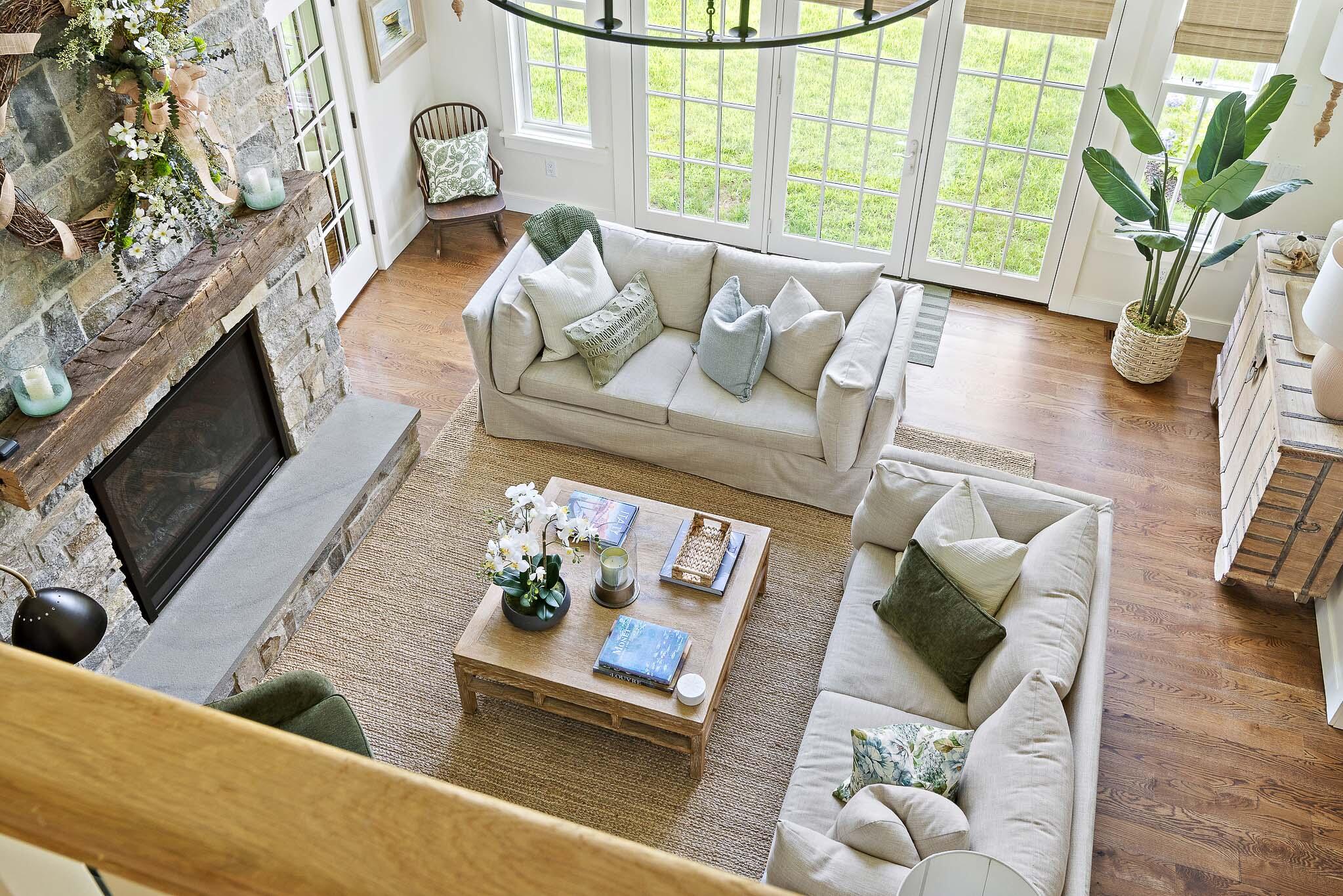 36 Crocker Drive Edgartown, MA 02539 - Photo 36 of 48 a living room with furniture fireplace and a large window