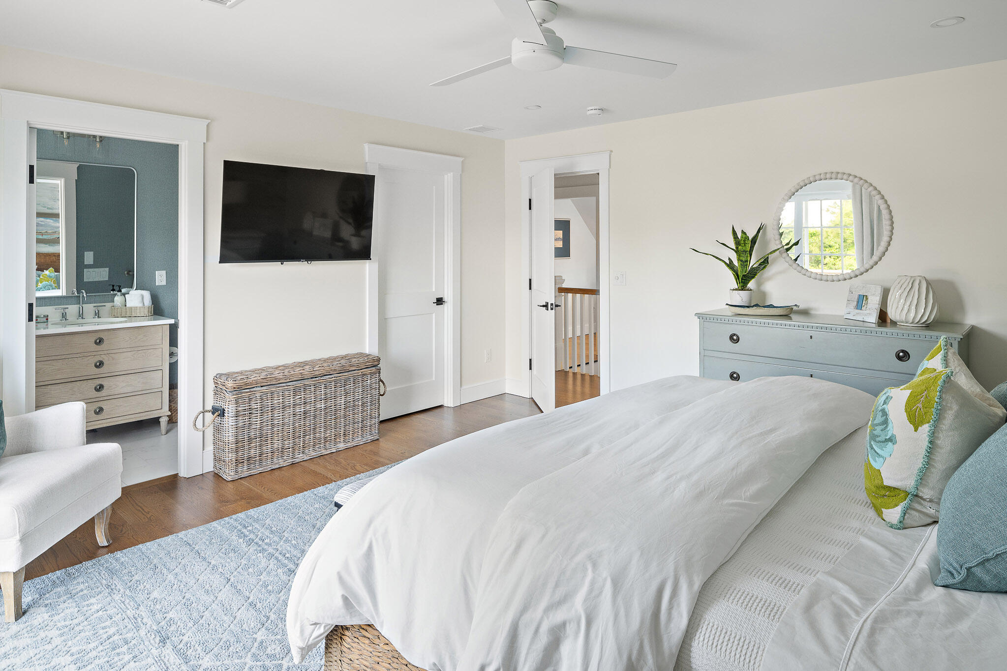 36 Crocker Drive Edgartown, MA 02539 - Photo 37 of 48 a bedroom with a bed and wooden floor