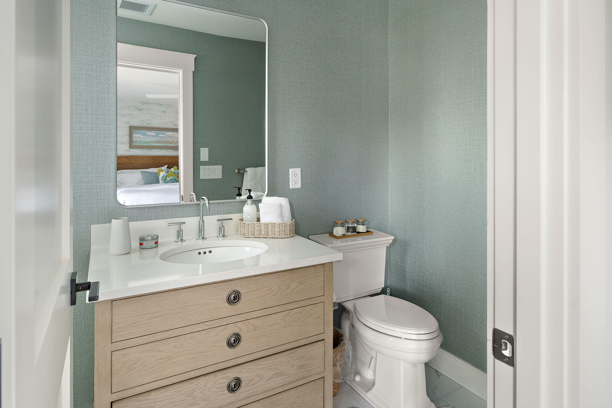 36 Crocker Drive Edgartown, MA 02539 - Photo 39 of 48 a bathroom with a granite countertop toilet a mirror and a sink