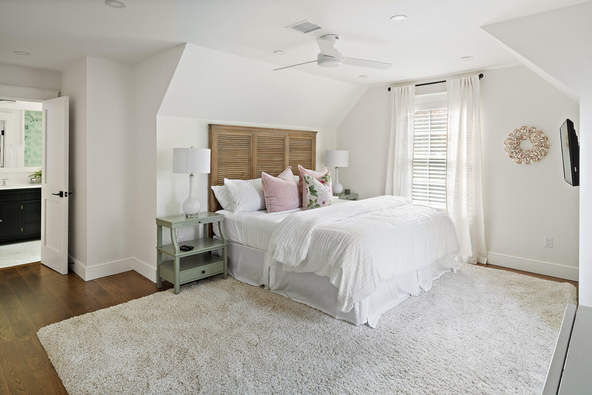 36 Crocker Drive Edgartown, MA 02539 - Photo 41 of 48 a bedroom with a bed and wooden floor