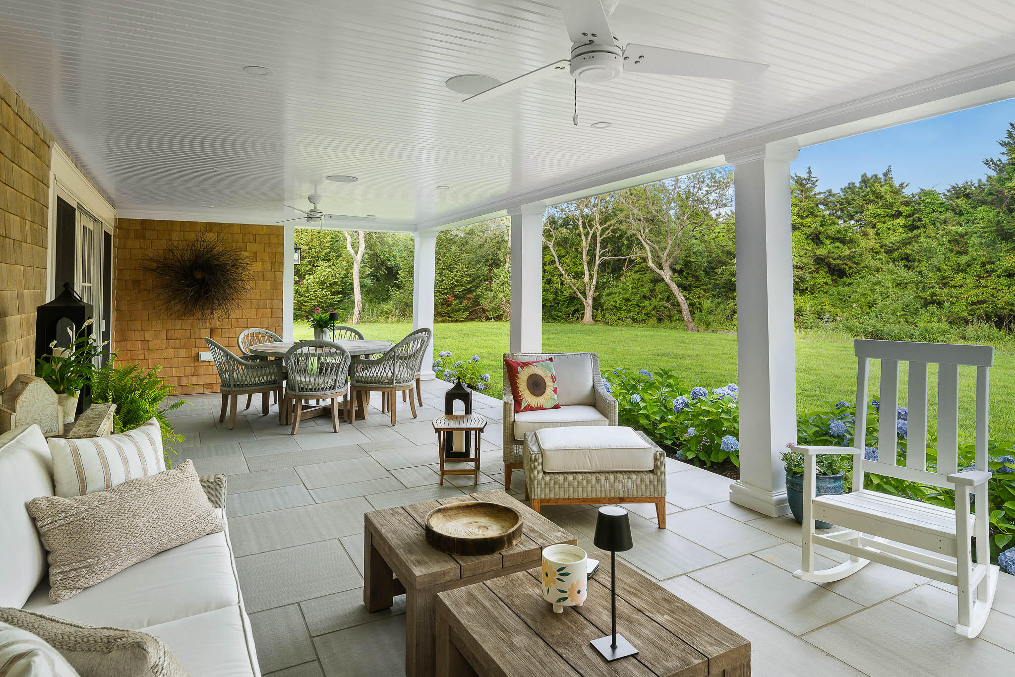 36 Crocker Drive Edgartown, MA 02539 - Photo 47 of 48 a living room with furniture and a floor to ceiling window