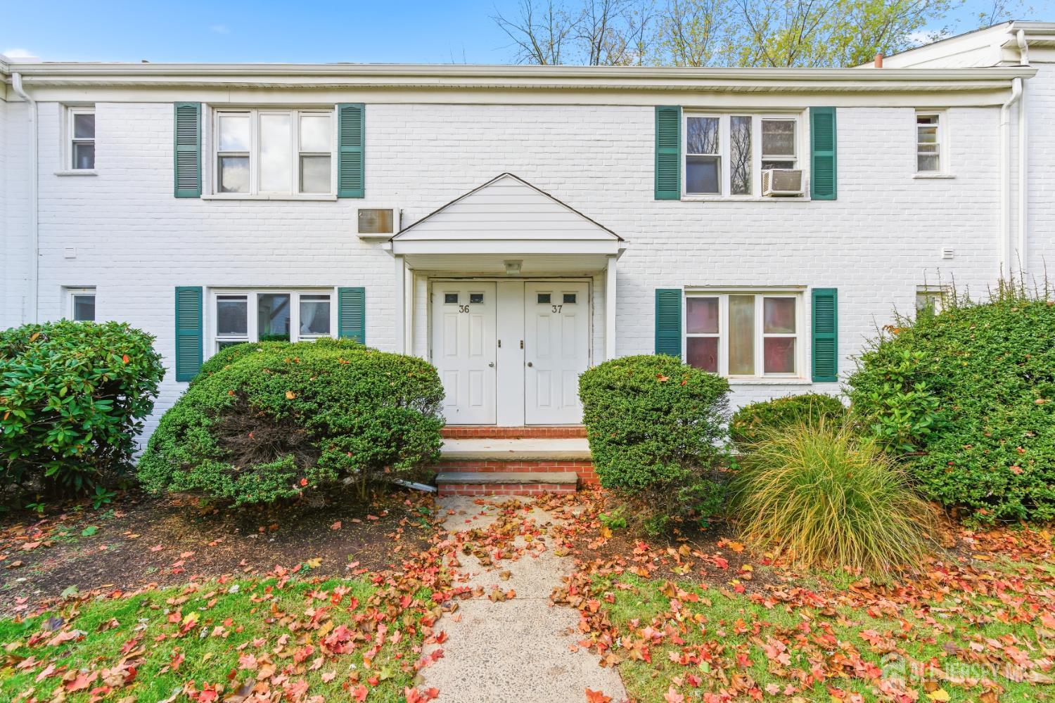 37B Garfield Park, Unit B Edison, NJ 08837 - Photo 1 of 18 a view of outdoor space yard and front view of a house