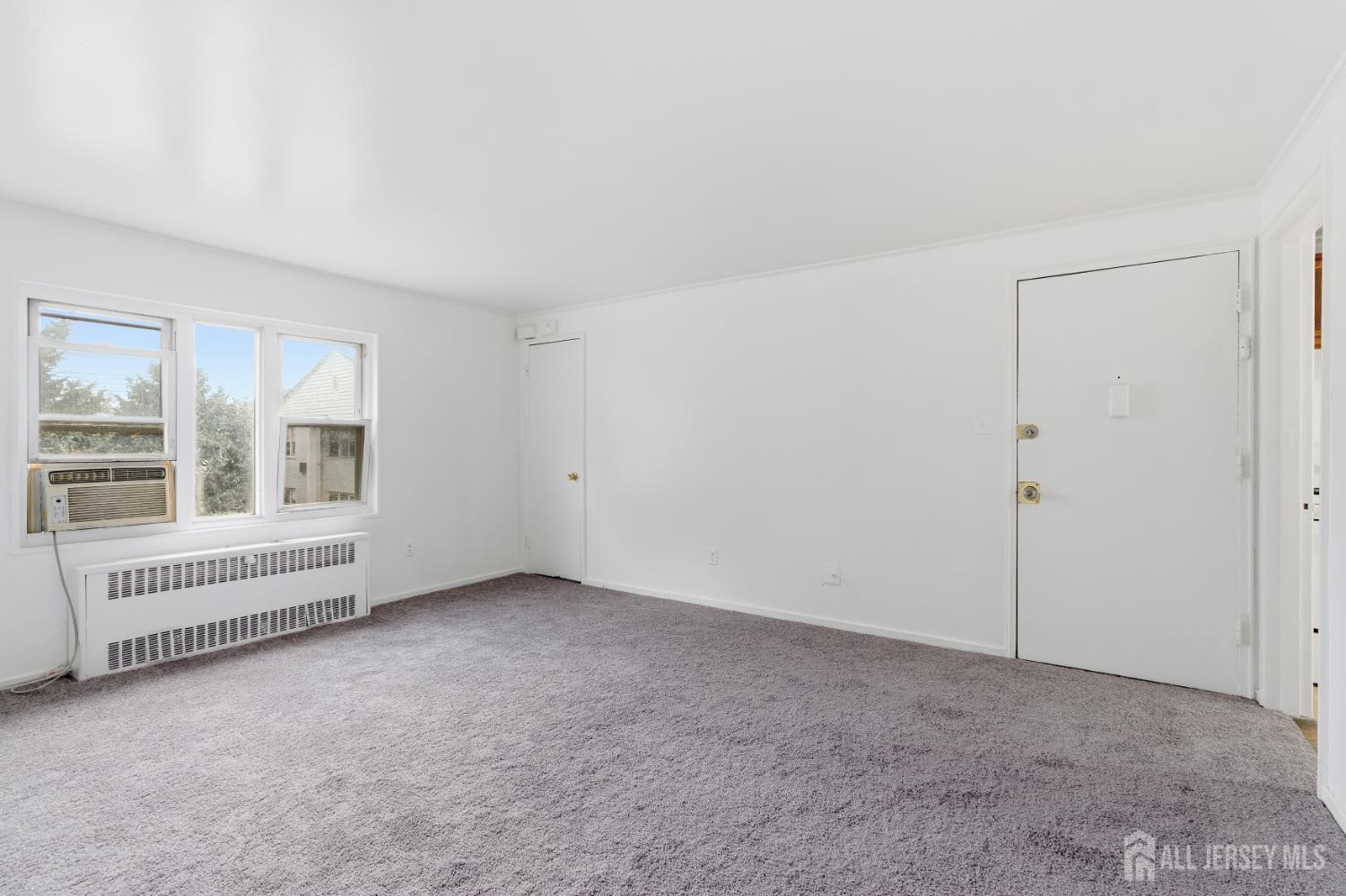 37B Garfield Park, Unit B Edison, NJ 08837 - Photo 6 of 18 an empty room with windows