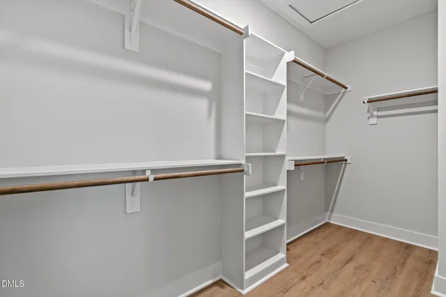 a view of an empty walk in closet