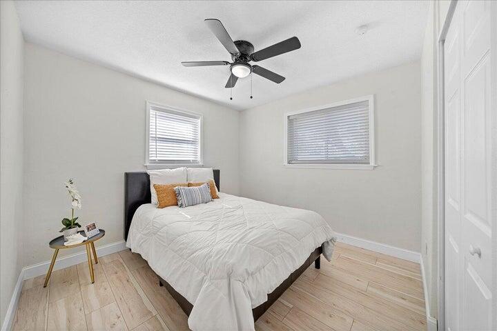 3401 Purdue Street Melbourne, FL 32901 - Photo 11 of 19 a bedroom with a bed and window