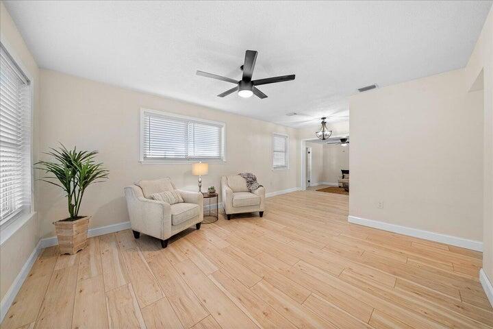 3401 Purdue Street Melbourne, FL 32901 - Photo 3 of 19 a living room with furniture and a large window