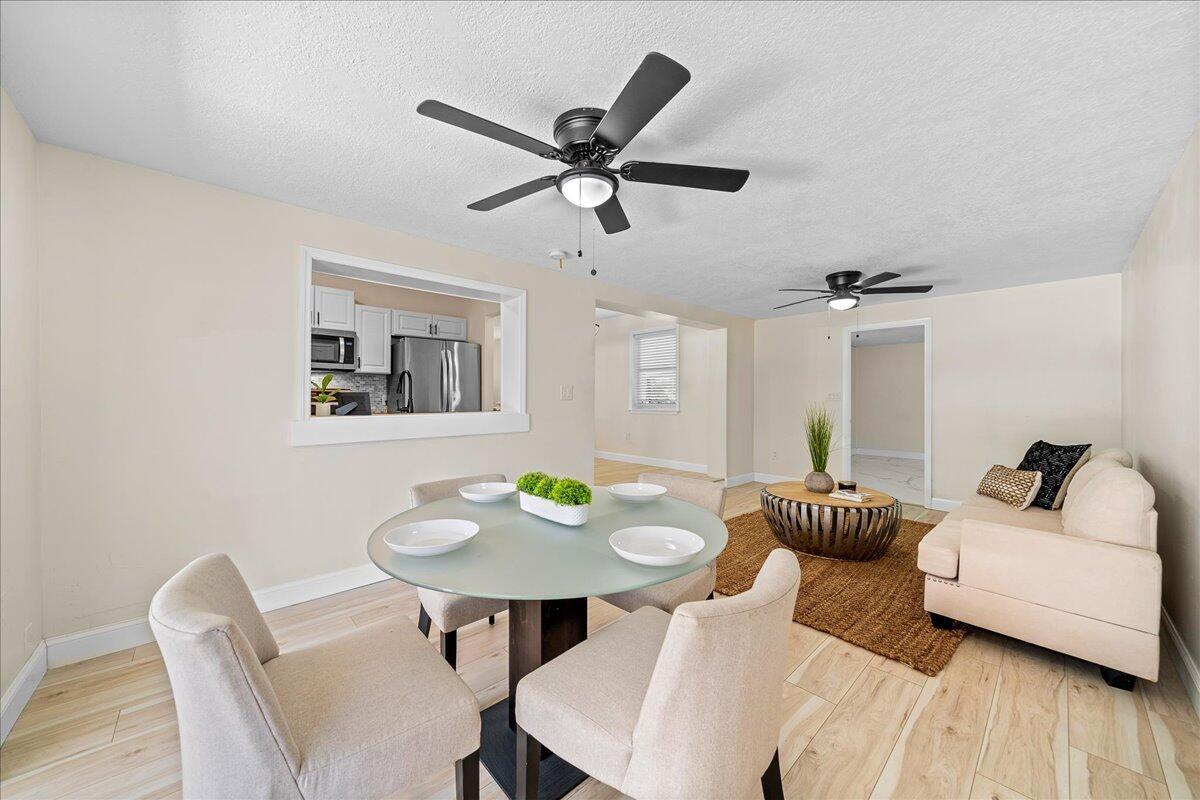 3401 Purdue Street Melbourne, FL 32901 - Photo 5 of 19 a living room with furniture and a wooden floor