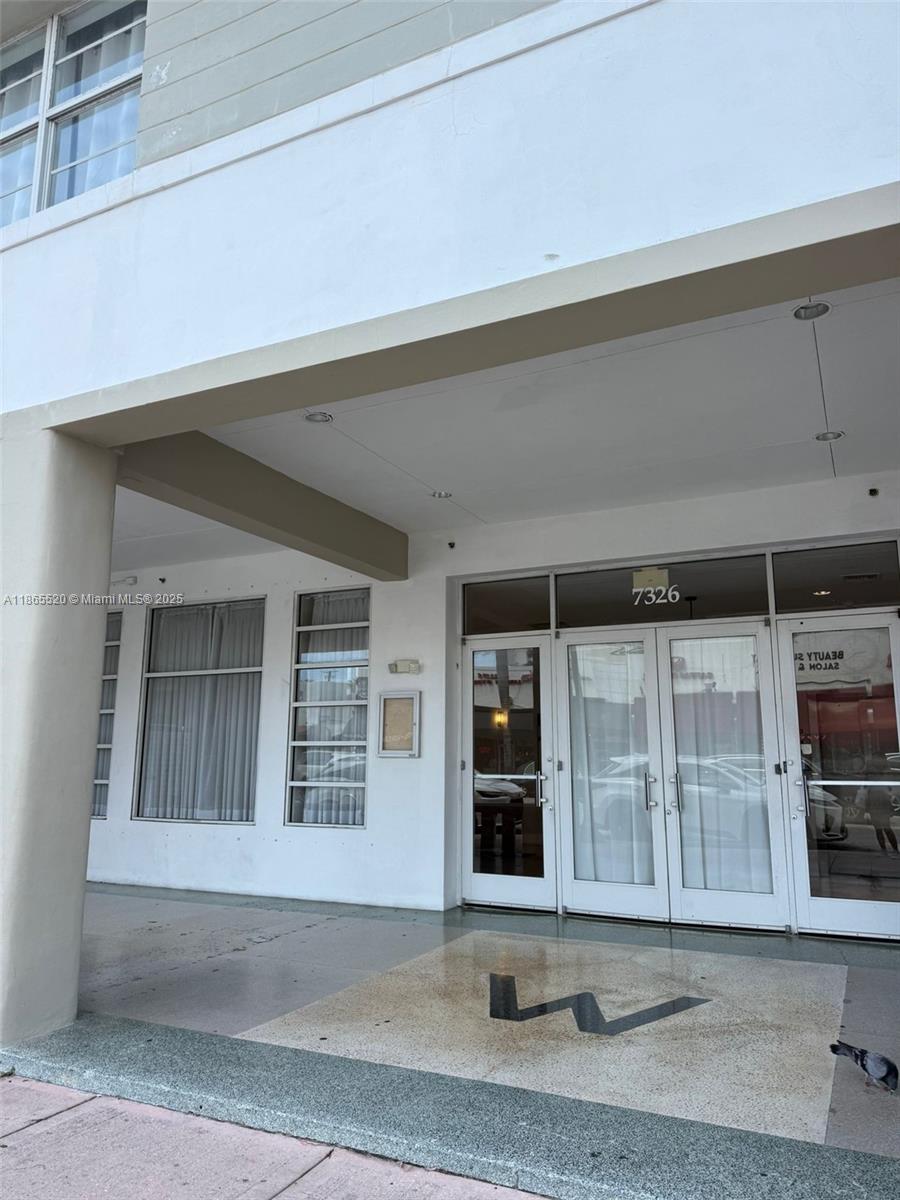 7326 Collins Avenue, Unit 105 Miami Beach, FL 33141 - Photo 13 of 13 a front view of a house